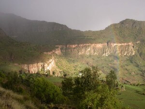 Rainbow comes out over the mountains in Tigray