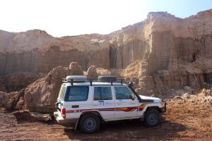 Tesfa Tours Landcruiser by salt canyons in Danakil Depression